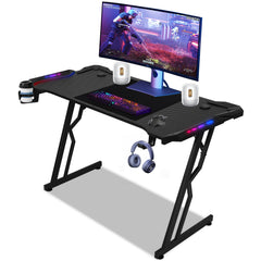 SWANEW Gaming Schreibtisch 120/140 cm, Gaming Tisch mit LED, Computertisch
